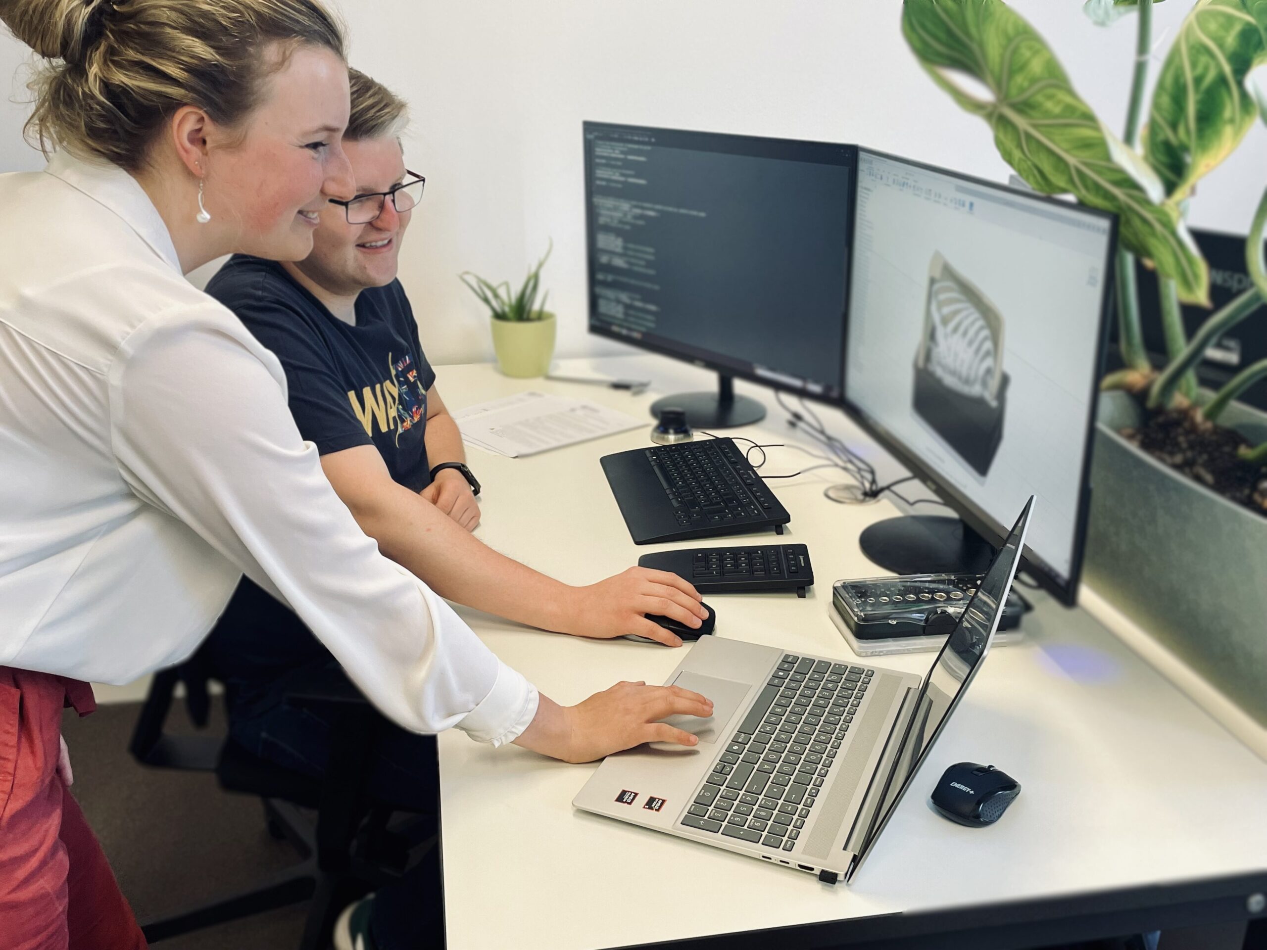 PhantomsMD team examining a prototype in the lab